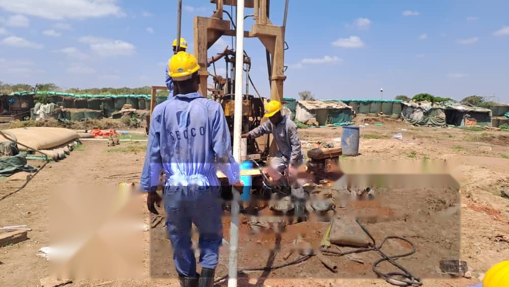 SECCO borehole drilling crew at work